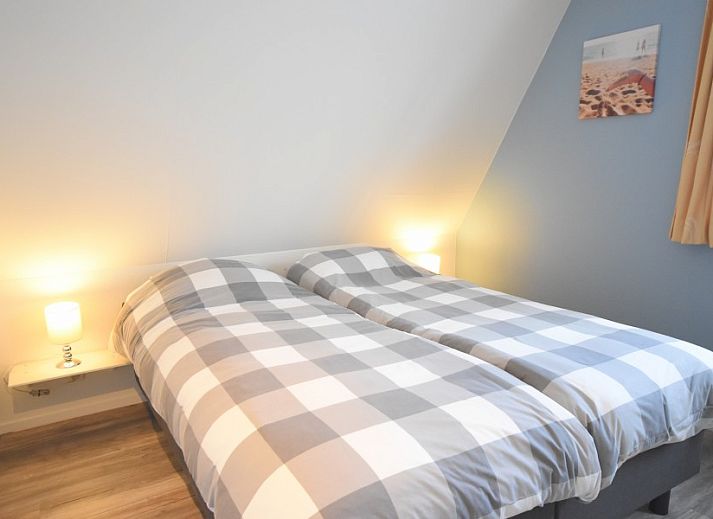 Buitenruimte van 4-6 persoons vakantiehuis in Sint Maartenszee, Noordzeekust, met terras en tuin.