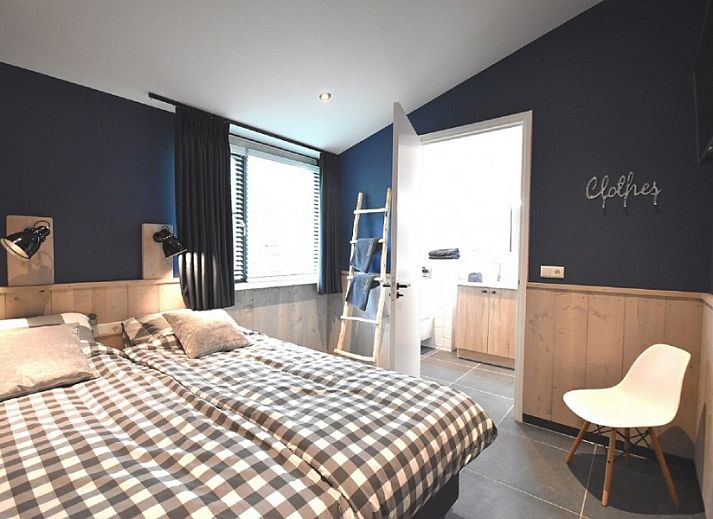 Stylish living room of Beachvilla bungalow in Sint Maartenszee with modern furnishings, North Sea coast, North Holland.