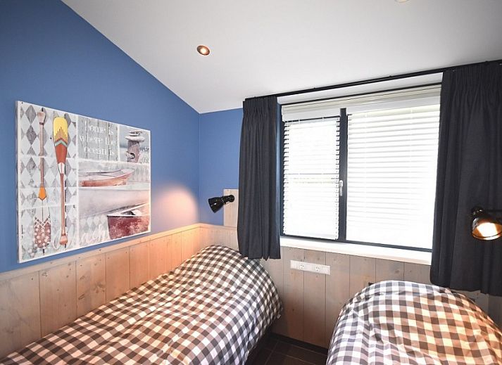 Stylish living room of Beachvilla bungalow in Sint Maartenszee with modern furnishings, North Sea coast, North Holland.