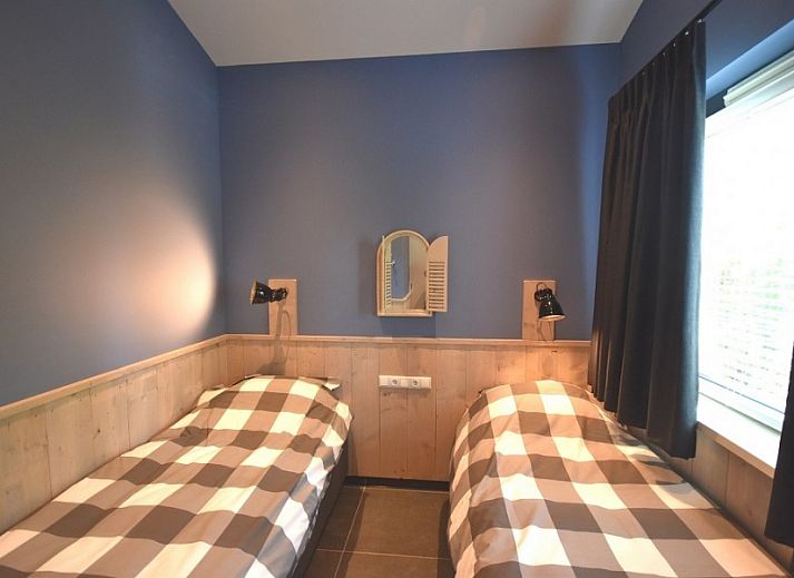 Stylish living room of Beachvilla bungalow in Sint Maartenszee with modern furnishings, North Sea coast, North Holland.