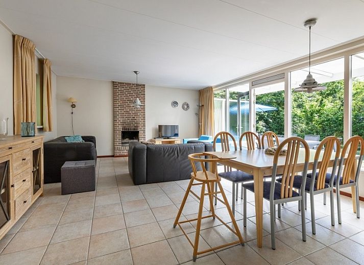 Spacious terrace at Bungalow type D, sleeps 6 in Sint Maartenszee, North Sea coast, North Holland with garden and deck chairs.