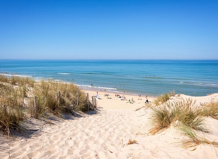 Modern kitchen in Bungalow type D, sleeps 6 in Sint Maartenszee, North Sea coast, North Holland with wooden cabinets.