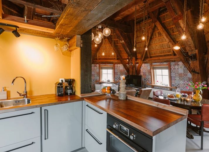 Schoene Muehle im Ferienhaus in Egmond aan den Hoef, Nordseekueste, Nordholland.