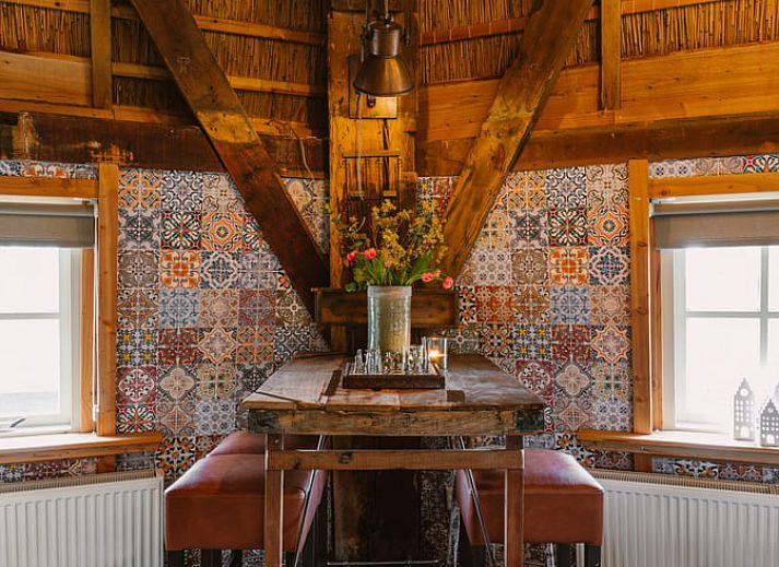 Gemuetliches Wohnzimmer im Ferienhaus in Egmond aan den Hoef, Nordseekueste, Nordholland.