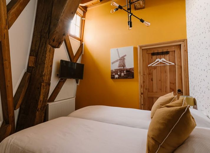 Geraeumige Sitzecke im Ferienhaus in Egmond aan den Hoef, Nordseekueste, Nordholland.