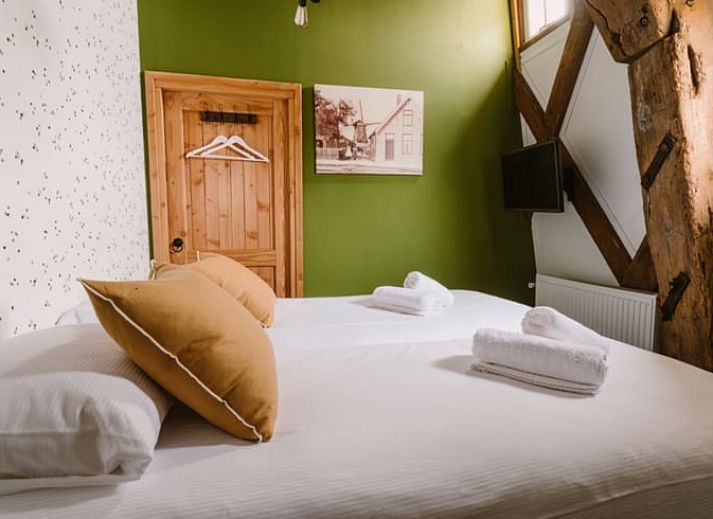 Geraeumige Sitzecke im Ferienhaus in Egmond aan den Hoef, Nordseekueste, Nordholland.