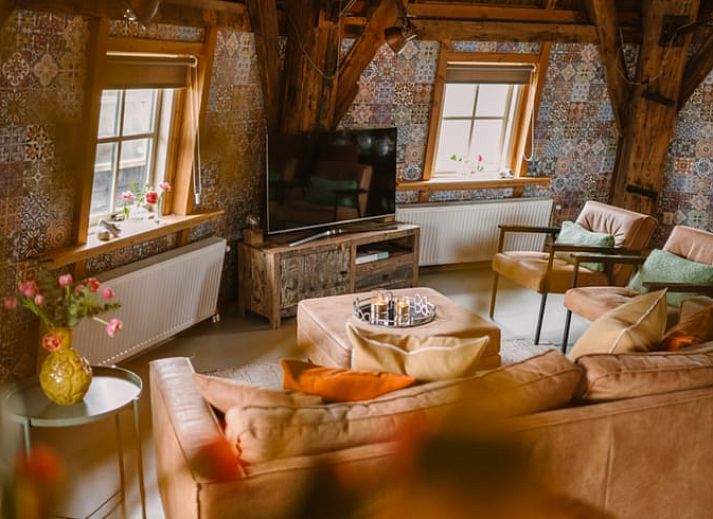 Geraeumige Sitzecke im Ferienhaus in Egmond aan den Hoef, Nordseekueste, Nordholland.