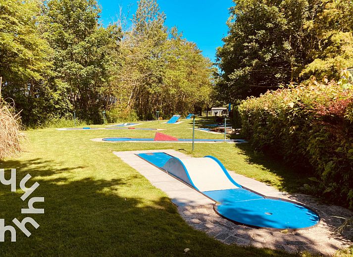 NH294 vakantiehuis in Schoorldam met kleurrijke tuin aan de Noordzeekust in Noord-Holland.