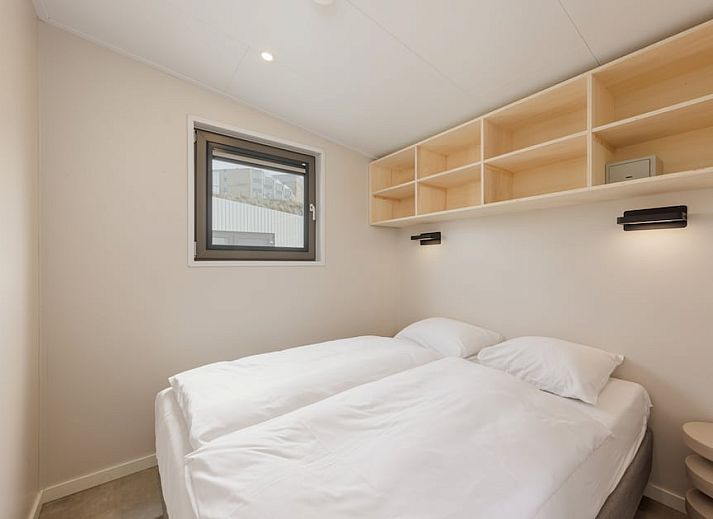 Beach House Sea 4, a modern beach house in Zandvoort, North Sea coast, North Holland, overlooking the sea and surrounded by sand dunes.