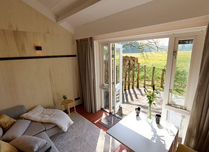 Cozy terrace at Holiday home in Castricum overlooking vast nature, North Sea coast, North Holland.