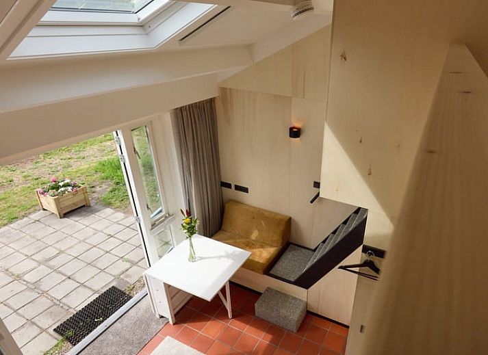 Cozy terrace at Holiday home in Castricum overlooking vast nature, North Sea coast, North Holland.