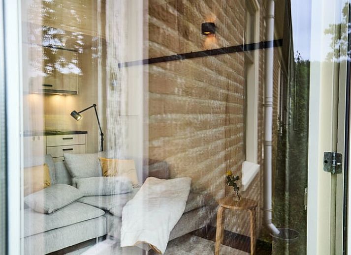 Cozy sitting area in Holiday home in Castricum on the North Sea coast, North Holland.