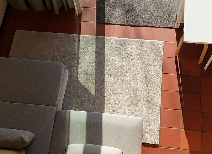 Bright living room with French doors in Holiday home in Castricum, North Sea coast, North Holland.