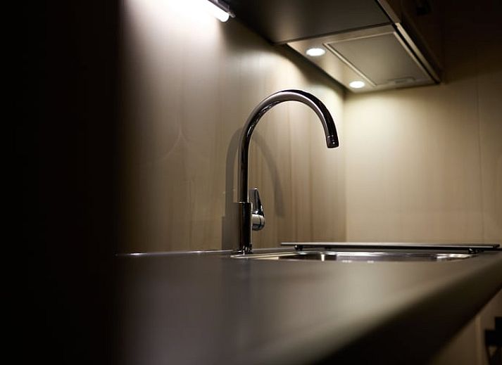 Modern interior of Holiday home in Castricum overlooking garden, North Sea coast, North Holland.