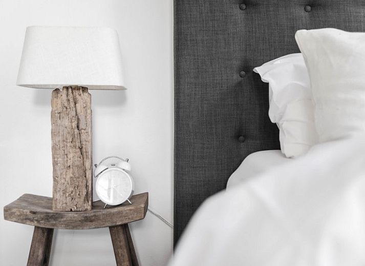 Comfortable bedroom in Villa Beau Lieu, Bergen, North Sea coast, North Holland, with luxurious bed and stylish interior.