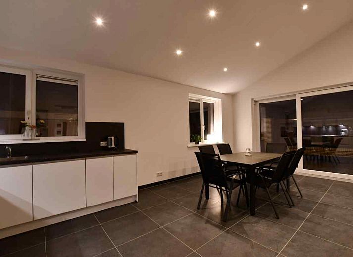 Terrace of vacation home NH114 in Julianadorp aan Zee, North Holland, with modern outdoor space.