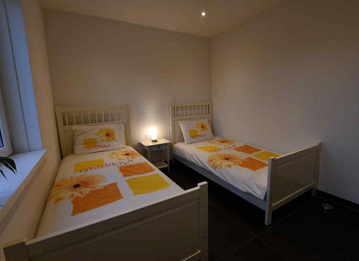 Terrace of vacation home NH114 in Julianadorp aan Zee, North Holland, with modern outdoor space.