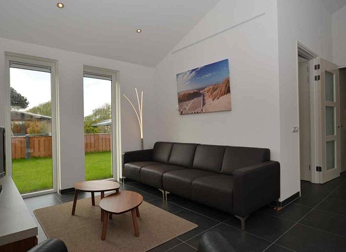 Cozy bedroom in NH114 vacation home, Julianadorp aan Zee, North Holland, with comfortable bed.