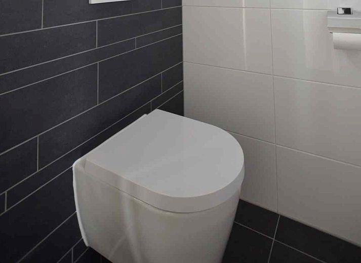 Sleek bathroom in vacation home NH114, Julianadorp aan Zee, North Holland, with modern plumbing.