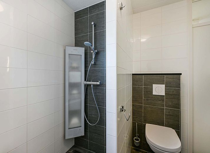 Stijlvolle woonkamer in vakantiewoning Julianadorp aan Zee, Noord-Holland