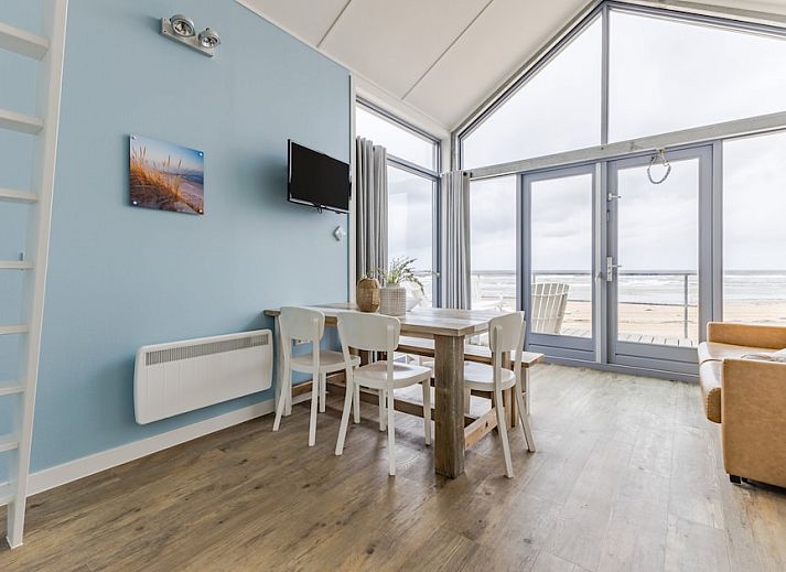 Cozy interior of Beach House 4-6, a vacation home in Julianadorp aan Zee, North Holland, with modern kitchen and comfortable seating area.
