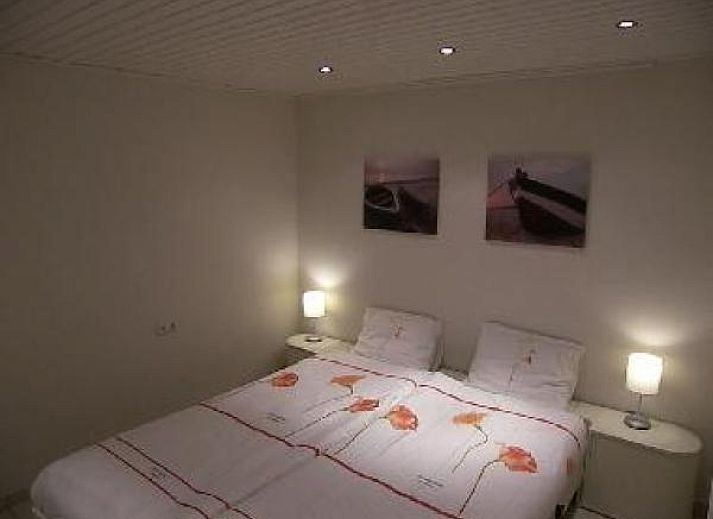 Attractive bedroom with bunk beds in vacation home NH080, Julianadorp aan Zee, North Holland, perfect for a relaxing stay on the North Sea coast.