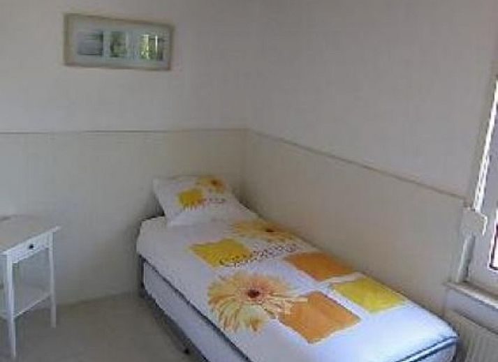 Cozy living room in vacation home NH080, Julianadorp aan Zee, overlooking the garden, North Sea coast, North Holland.