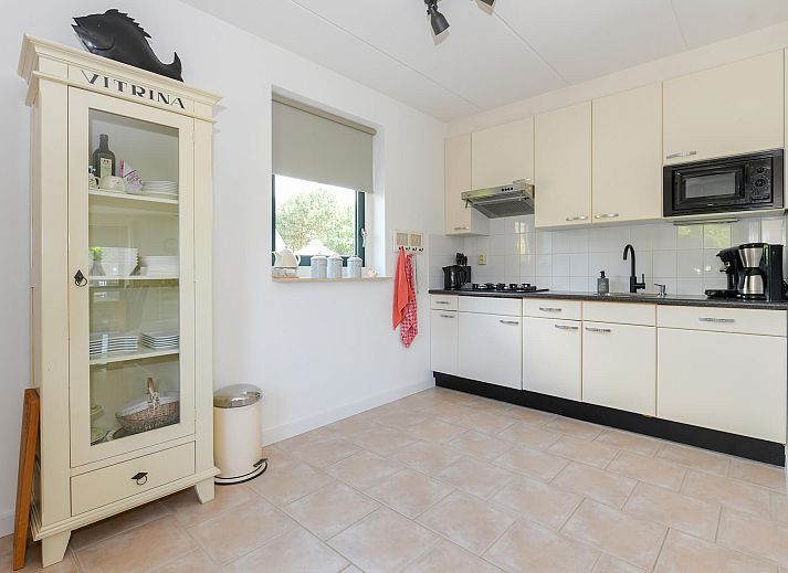 Gezellige tuin bij vakantiewoning in Julianadorp aan Zee, Noord-Holland.