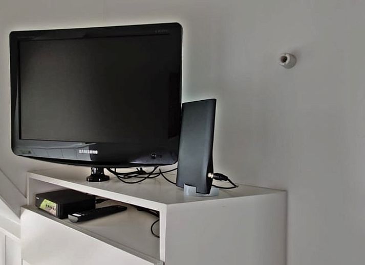 Huisje in Warmenhuizen bij zonsondergang, Noordzeekust, Noord-Holland vakantiehuis.