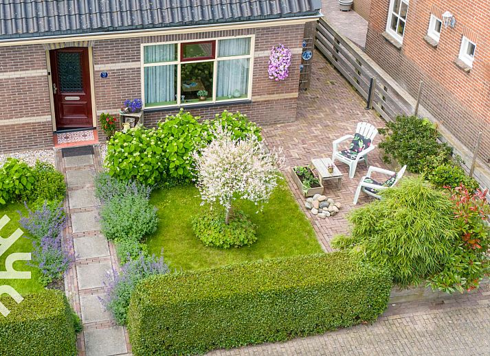 Helles Wohnzimmer des NH093 Ferienhauses in Warmenhuizen, Nordseekueste, Nordholland.