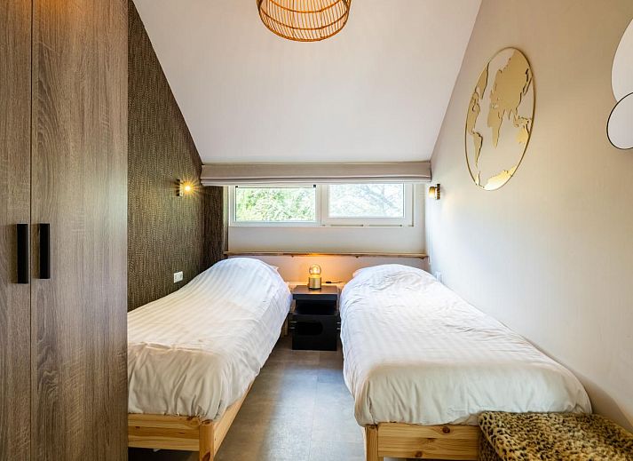 Comfortable bedroom in vacation home Rekerlanden 1, Warmenhuizen, North Sea coast, North Holland with luxurious beds.