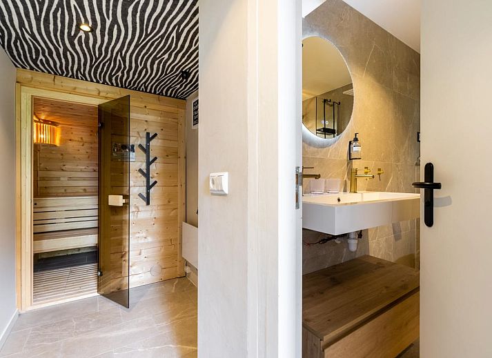 Luxury bathroom in Rekerlanden 1, Warmenhuizen, North Sea coast, North Holland with modern rain shower.