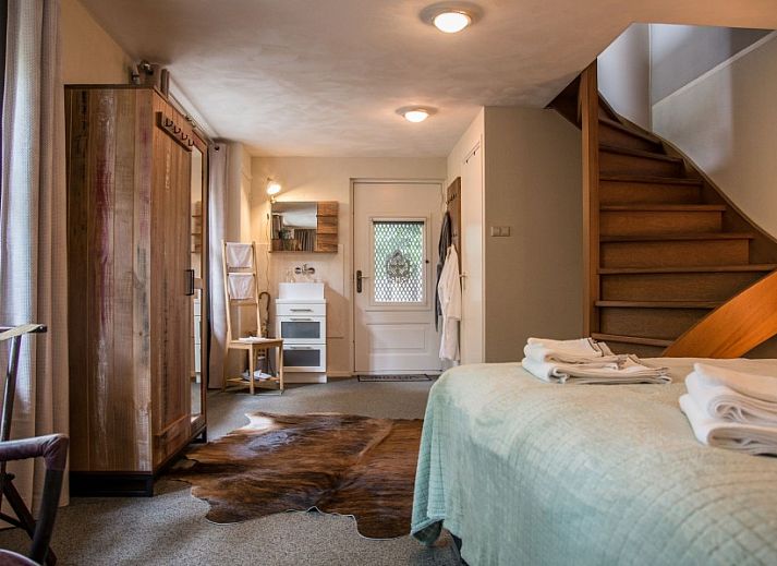 Casa Allegria in Bergen, Noord-Holland, vakantiehuis met weelderige tuin en groene omgeving aan de Noordzeekust.