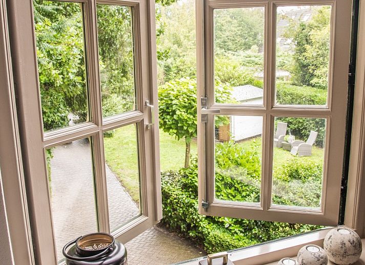 Casa Allegria in Bergen, Noord-Holland, vakantiehuis met weelderige tuin en groene omgeving aan de Noordzeekust.