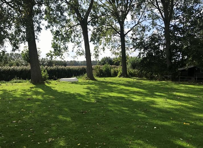 Cozy indoor area in Holiday Home in Andijk with comfortable seating area, ideal for relaxation.