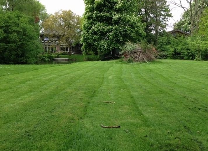 Cozy indoor area in Holiday Home in Andijk with comfortable seating area, ideal for relaxation.