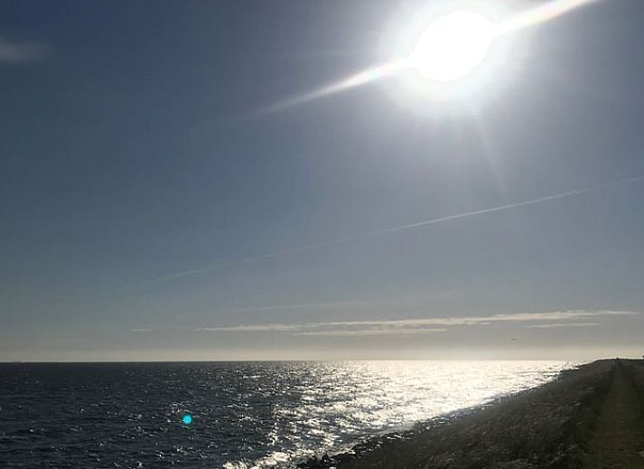 Cozy indoor area in Holiday Home in Andijk with comfortable seating area, ideal for relaxation.