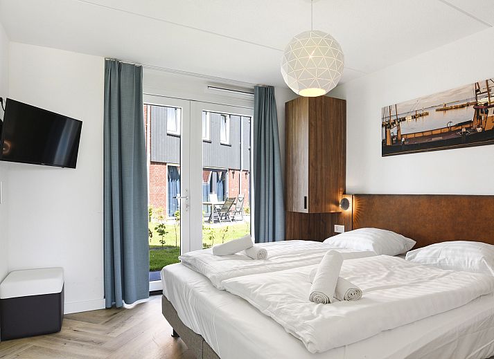 Ontspannen bij de haard in Volendam 6-persoons bungalow, IJsselmeerkust.