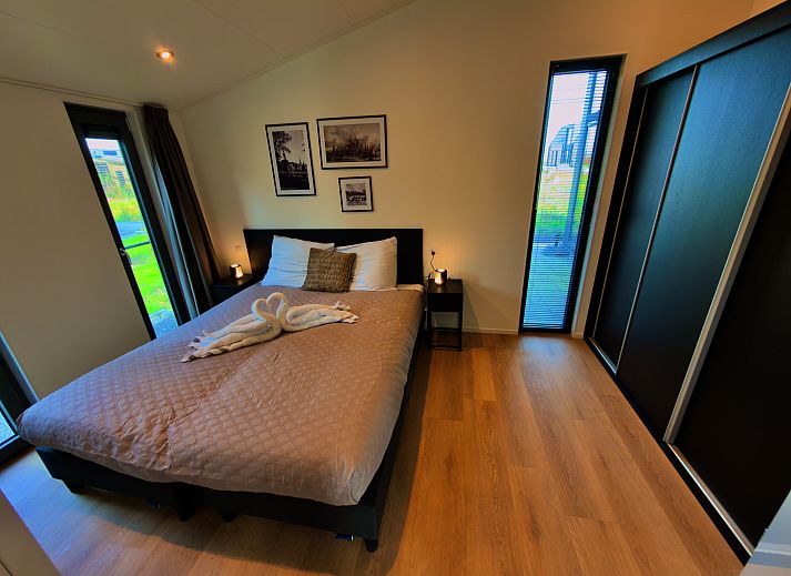 Detached house in Enkhuizen, a modern vacation home on the IJsselmeer coast, North Holland, with a sunny terrace and contemporary architecture.