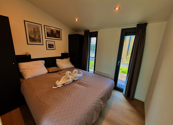 Cozy bedroom in a detached house in Enkhuizen, North Holland, with a comfortable bed and modern furnishings on the IJsselmeer coast.