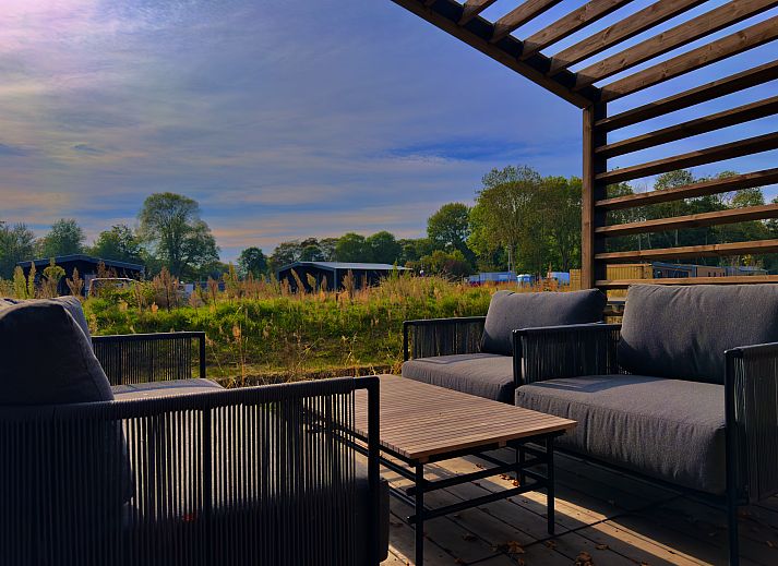 Enjoy the serene surroundings on the terrace of this detached house in Enkhuizen, located on the IJsselmeer coast in North Holland.