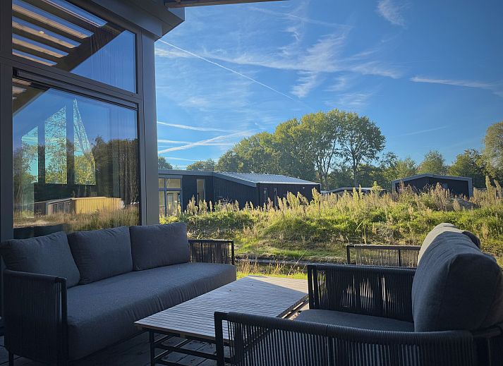 Enjoy the serene surroundings on the terrace of this detached house in Enkhuizen, located on the IJsselmeer coast in North Holland.