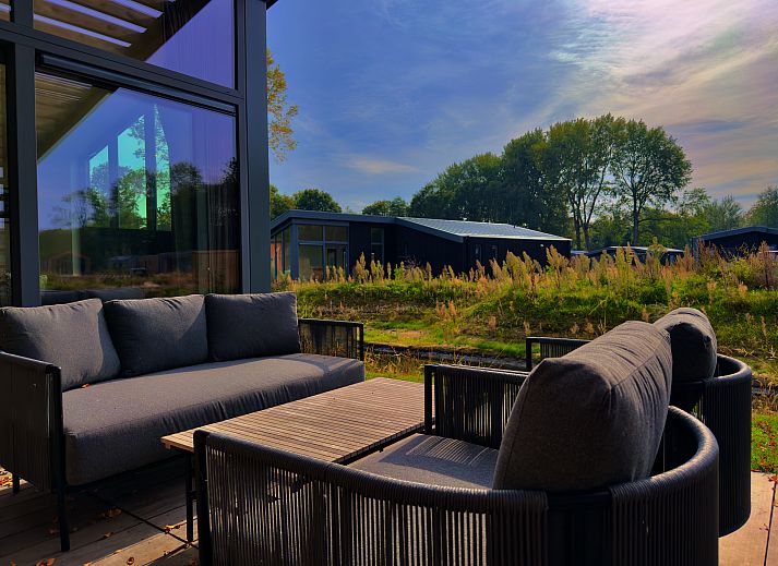 Enjoy the serene surroundings on the terrace of this detached house in Enkhuizen, located on the IJsselmeer coast in North Holland.