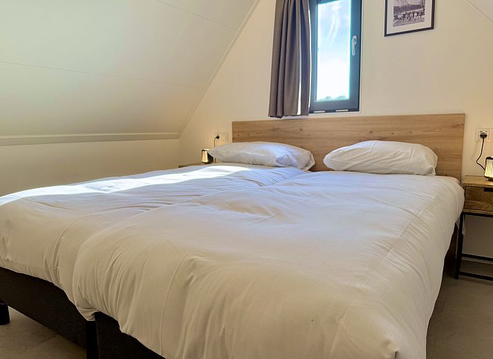 Genieen Sie die Sonne auf der Veranda des freistehenden Hauses in Enkhuizen, einem Ferienhaus an der Kste des IJsselmeers in Nordholland.