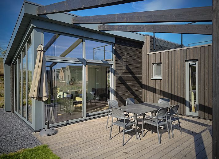 View from the terrace of the detached house in Enkhuizen, vacation home on the IJsselmeer coast, North Holland, with panoramic views of nature.