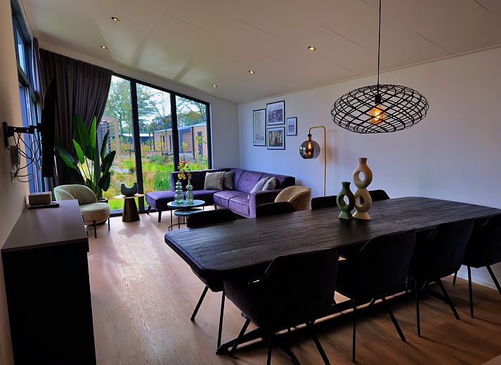 View from the terrace of the detached house in Enkhuizen, vacation home on the IJsselmeer coast, North Holland, with panoramic views of nature.