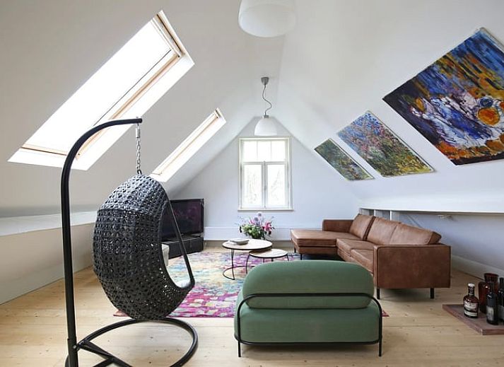 Ferienhaus in Kwadijk, ein charmantes Ferienhaus in der gruenen Umgebung der IJsselmeerkueste, Nordholland, mit traditioneller Architektur.