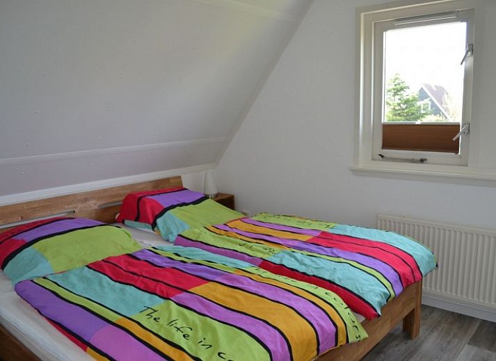 Geniessen Sie die sonnige Terrasse im Ferienhaus Maike, einem gemuetlichen Ferienhaus an der Nordseekueste in Nordholland.