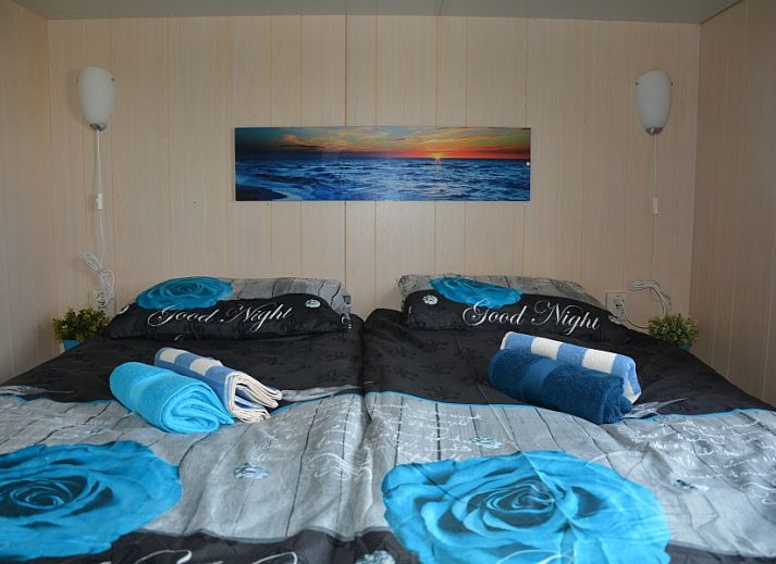 Luchtfoto van CORIMAR vakantiehuis in Ballum, Ameland met omheind terras.