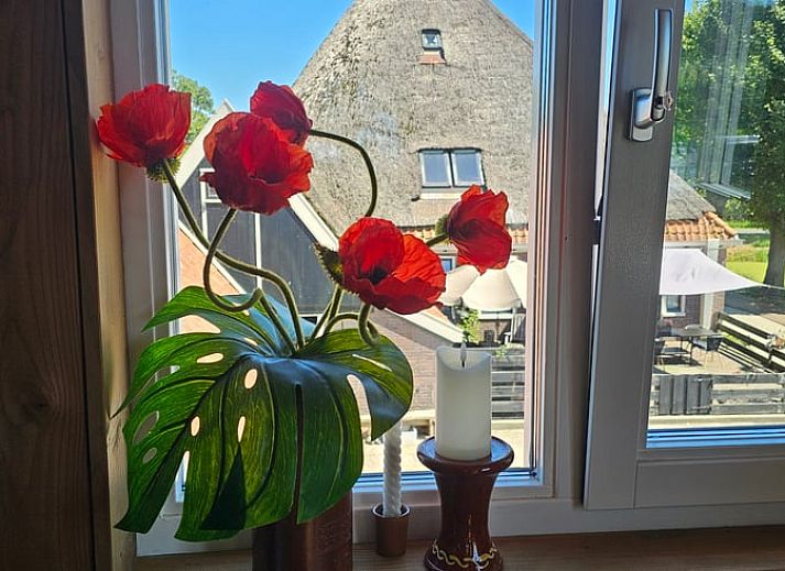 Authentic ceramic decorations at the Holiday Home in Hoogwoud, North Holland North, reflect local charm.